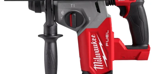 Cordless SDS-Plus rotary hammer with auxiliary handle, depth rod, mode selector and empty battery interface.